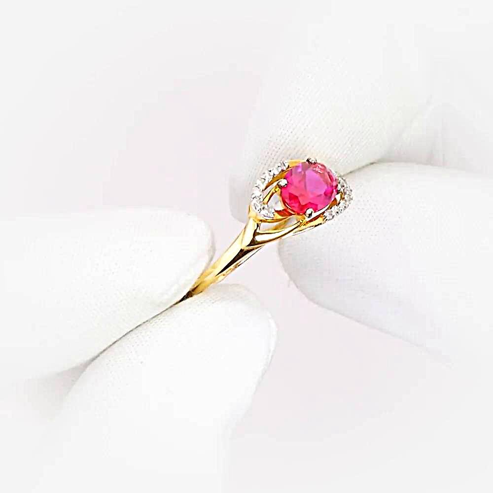 Кольцо с рубином синтетическим и бриллиантами из красного золота 585 пробы 1