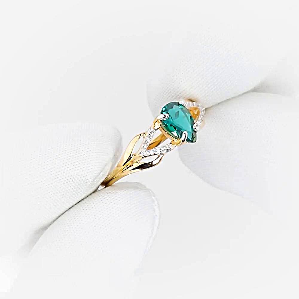 Кольцо с гидротермальным изумрудом и бриллиантами из красного золота 585 пробы 1