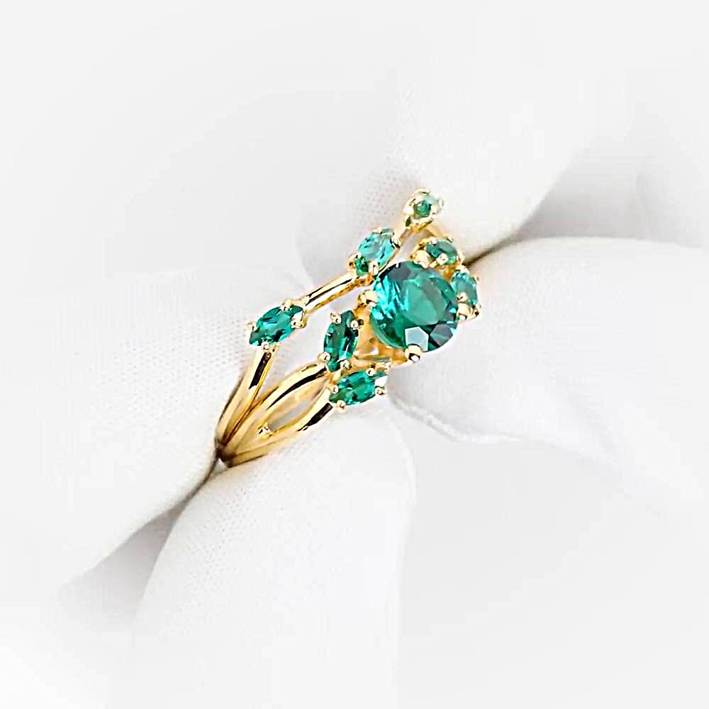 Кольцо с гидротермальными изумрудами из красного золота 585 пробы 1