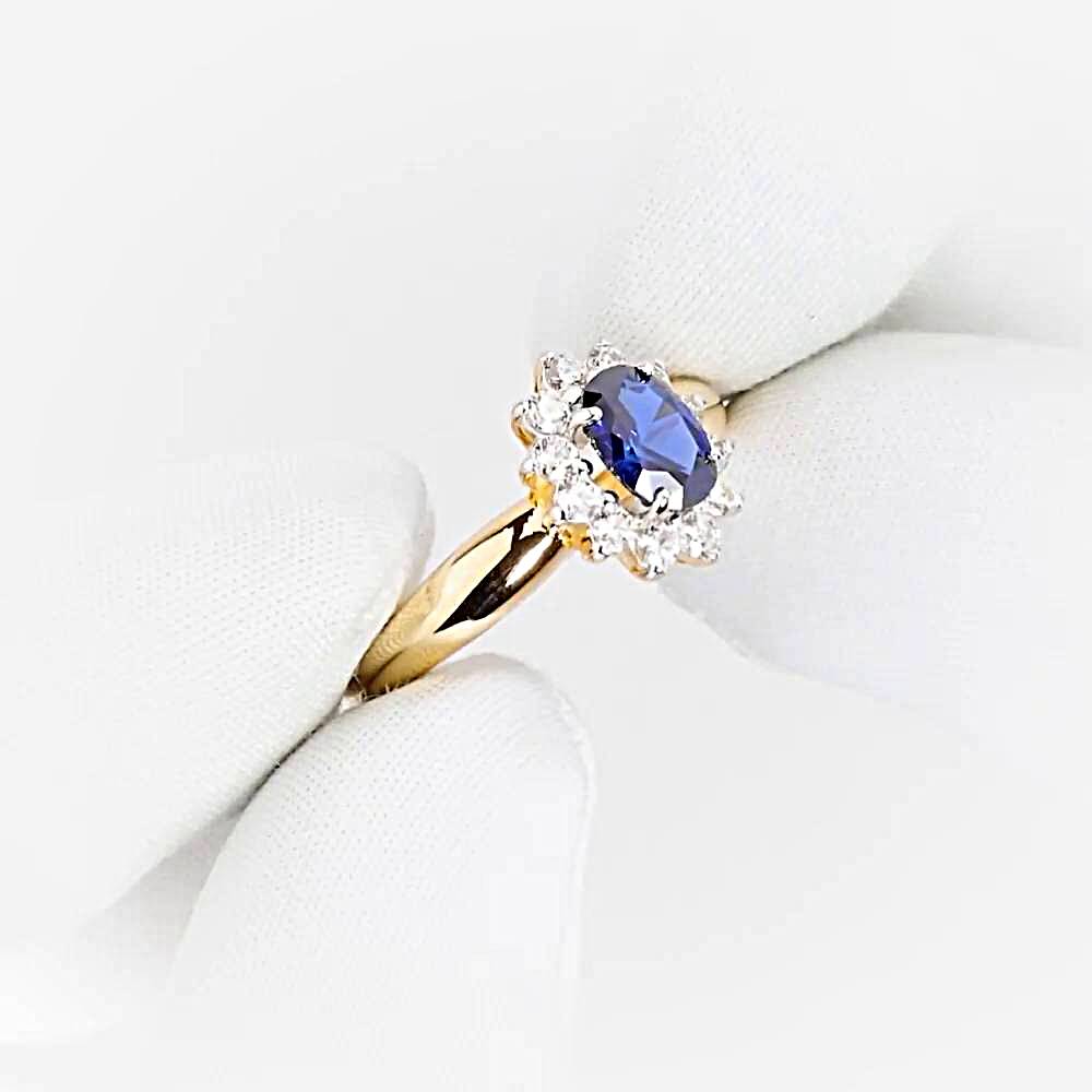 Кольцо с сапфиром синтетическим и бриллиантами из красного золота 585 пробы