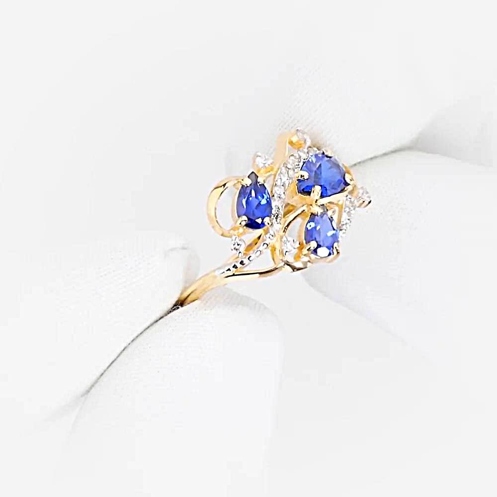 Кольцо с сапфиром синтетическим и бриллиантами из красного золота 585 пробы