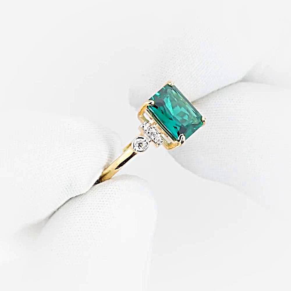 Кольцо с гидротермальным изумрудом и бриллиантами из красного золота 375 пробы 1