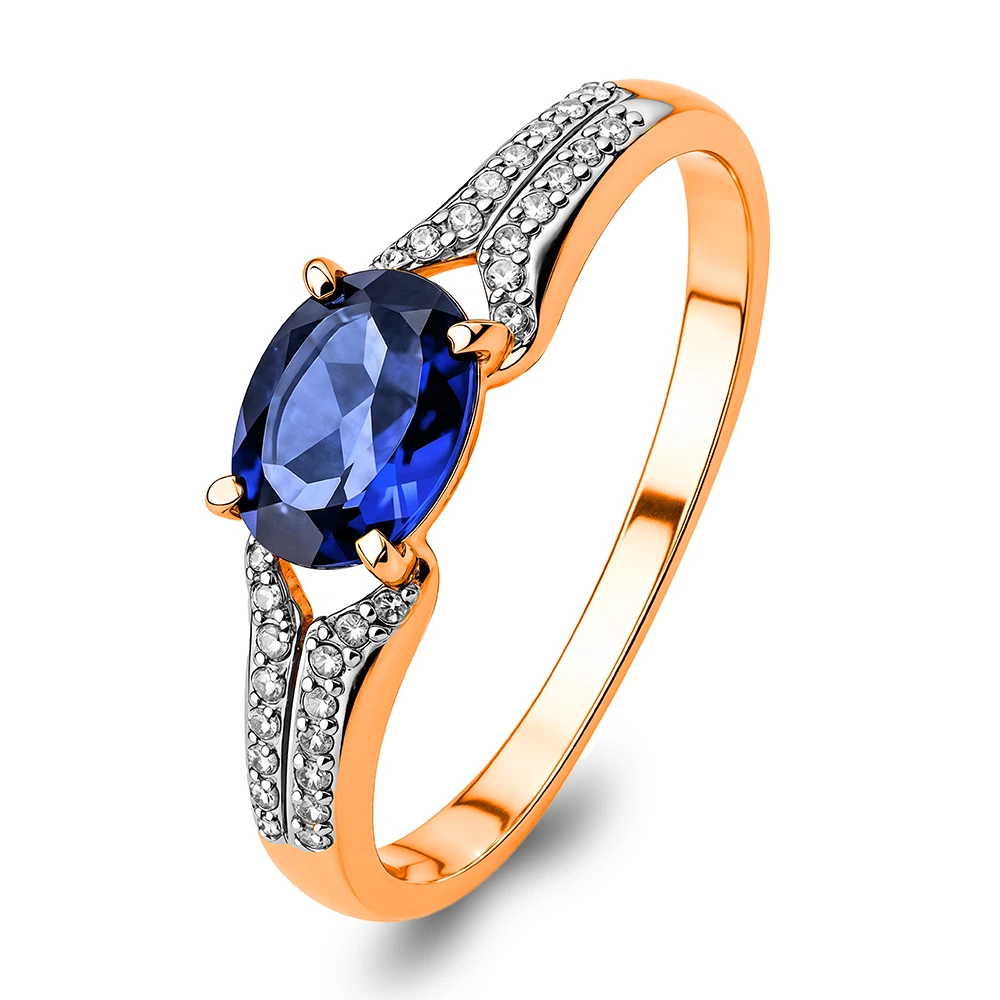 Кольцо с сапфиром синтетическим и бриллиантами из красного золота 375 пробы Кольцо с сапфиром синтетическим и бриллиантами из красного золота 375 пробы