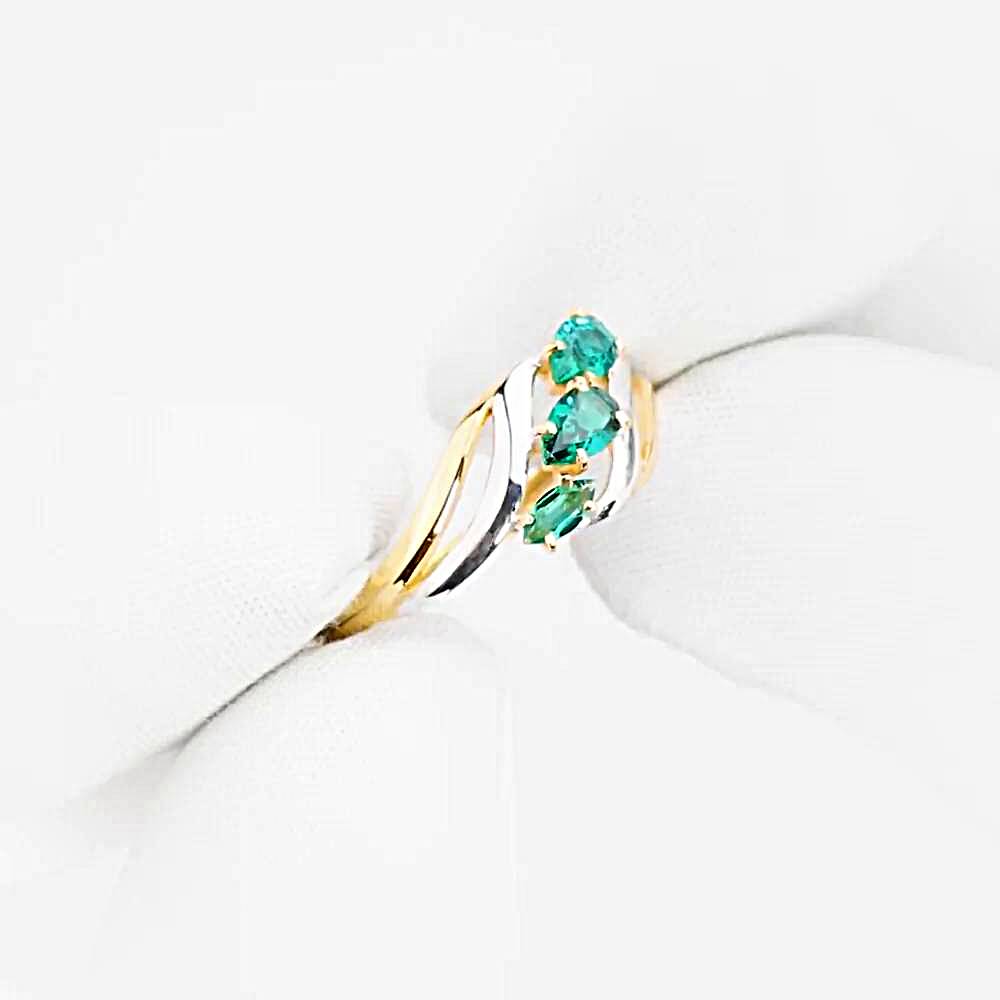 Кольцо с гидротермальными изумрудами из красного золота 375 пробы 1