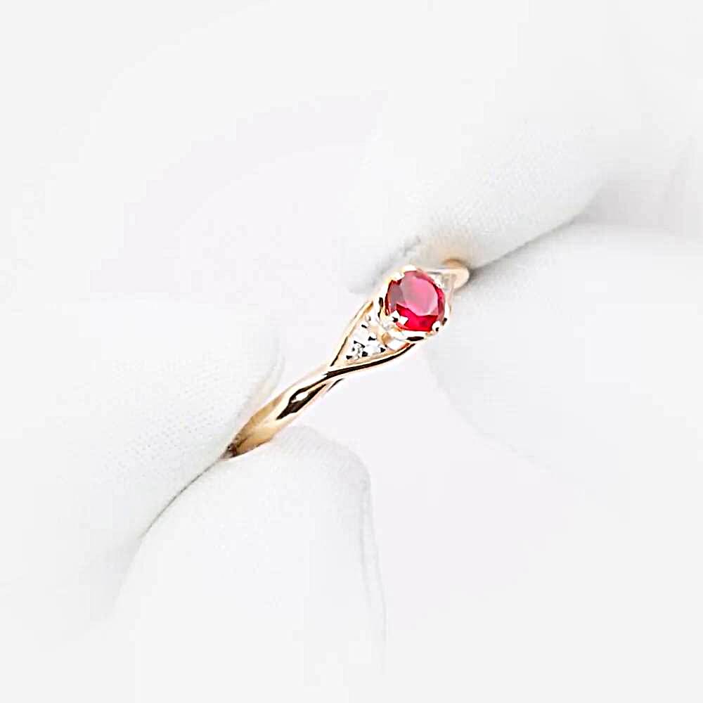 Кольцо с рубином синтетическим и бриллиантами из красного золота 375 пробы 1