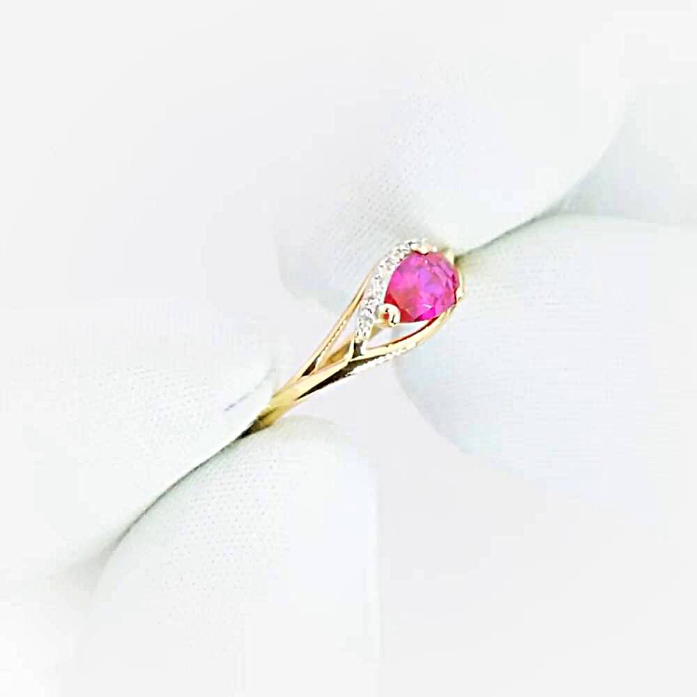 Кольцо с рубином синтетическим и бриллиантами из красного золота 375 пробы 1