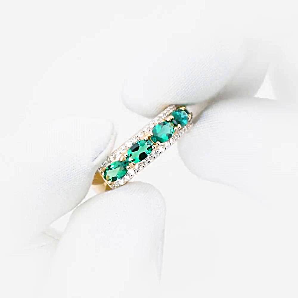 Кольцо с гидротермальным изумрудом и бриллиантами из красного золота 585 пробы