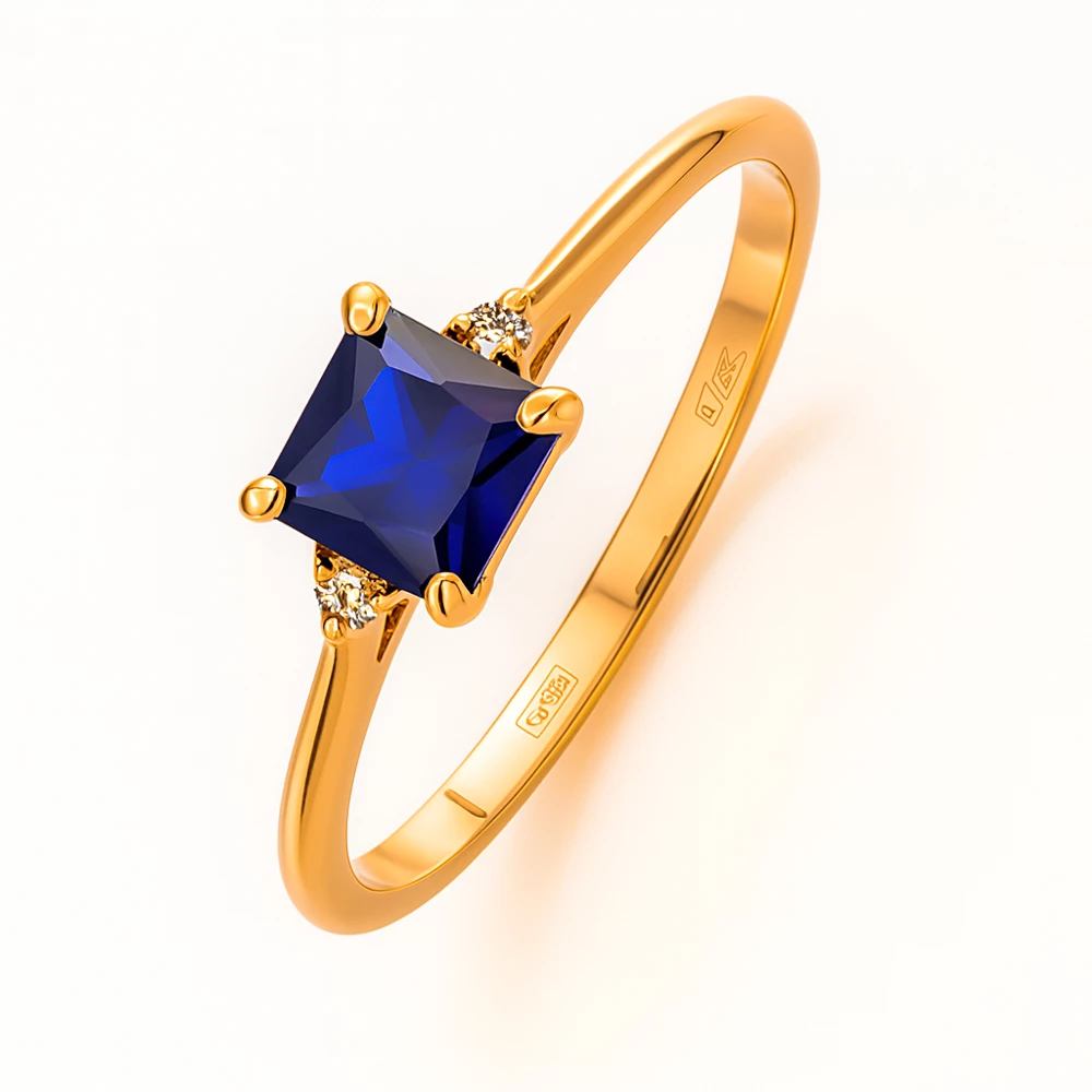 Кольцо с сапфиром синтетическим и бриллиантами из красного золота 585 пробы Кольцо с сапфиром синтетическим и бриллиантами из красного золота 585 пробы