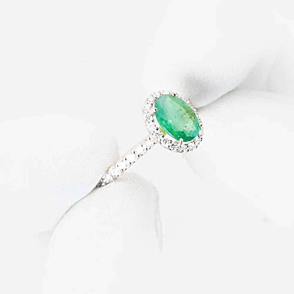 Кольцо с изумрудами и бриллиантами из красного золота 585 пробы