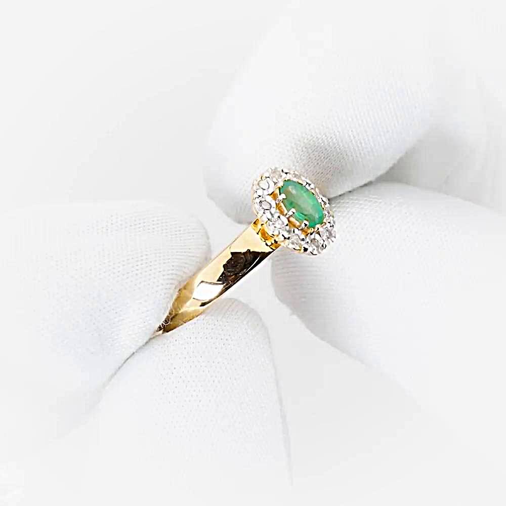 Кольцо с изумрудами и бриллиантами из красного золота 585 пробы Кольцо с изумрудами и бриллиантами из красного золота 585 пробы