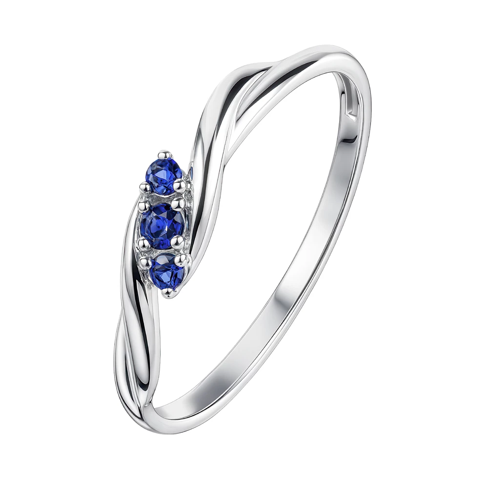 Кольцо с сапфирами синтетическими из белого золота 585 пробы Кольцо с сапфирами синтетическими из белого золота 585 пробы