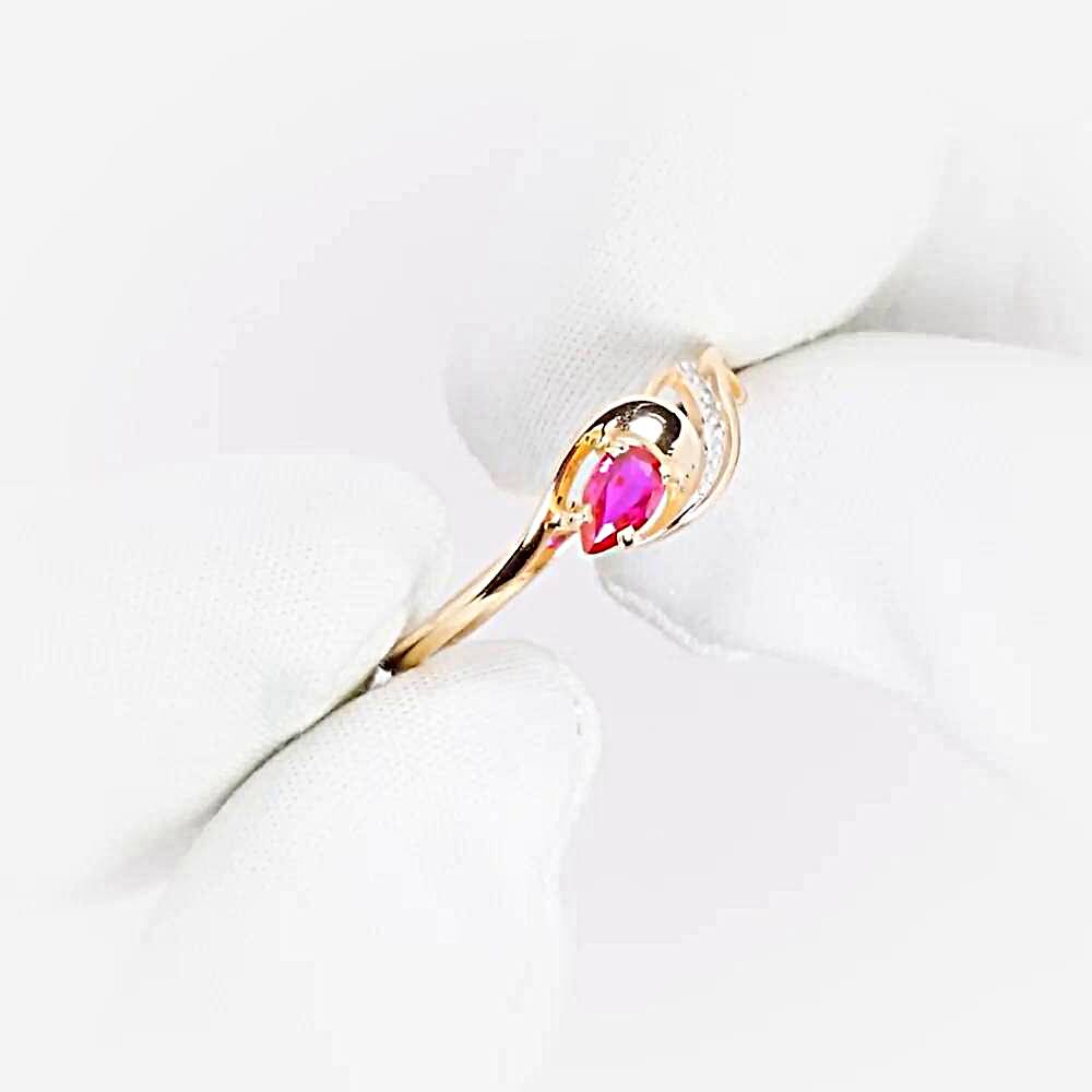 Кольцо с рубином синтетическим и бриллиантами из красного золота 375 пробы 1