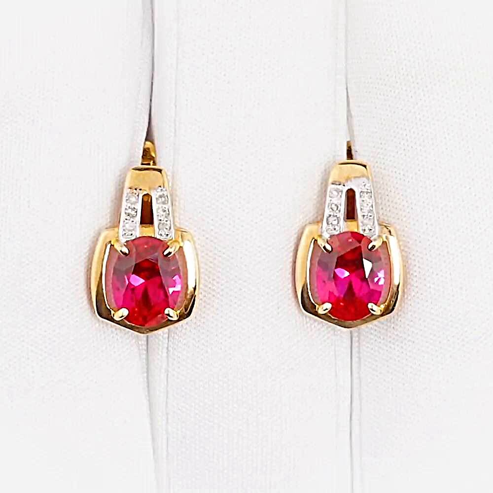 Серьги с рубином синтетическим и бриллиантами из красного золота 375 пробы 1