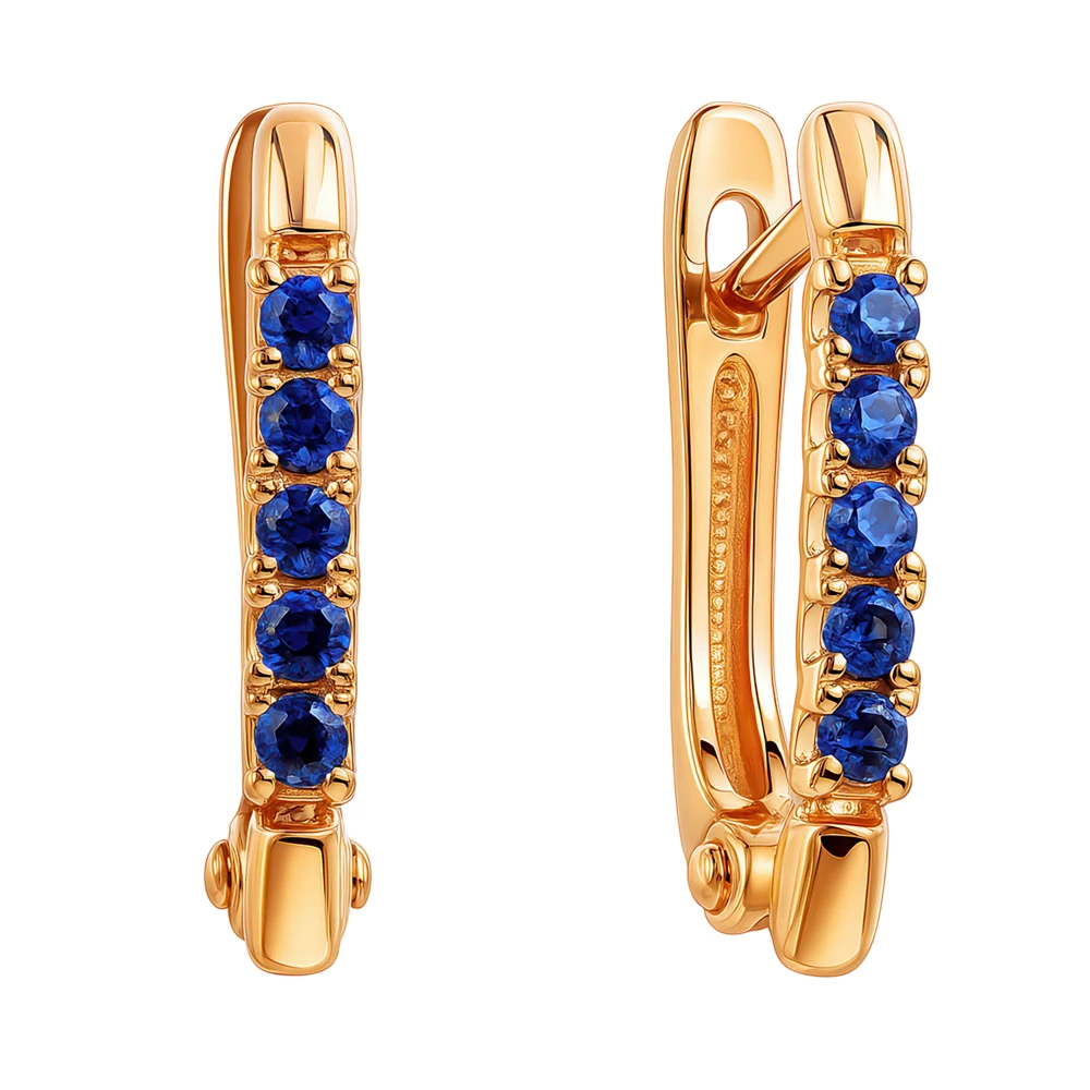 Серьги с сапфирами синтетическими из красного золота 375 пробы Серьги с сапфирами синтетическими из красного золота 375 пробы