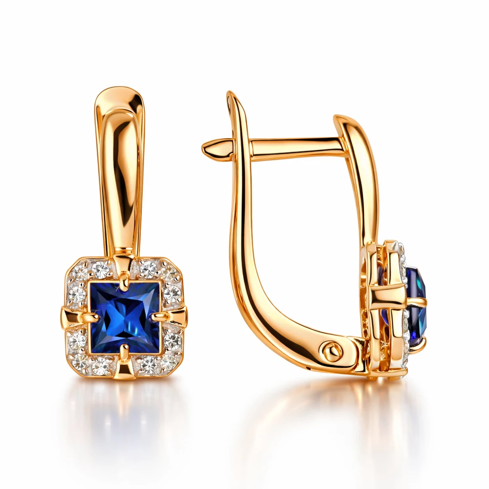 Серьги с сапфиром синтетическим и бриллиантами из красного золота 585 пробы Серьги с сапфиром синтетическим и бриллиантами из красного золота 585 пробы