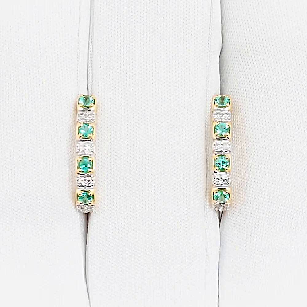 Серьги с изумрудами и бриллиантами из красного золота 585 пробы