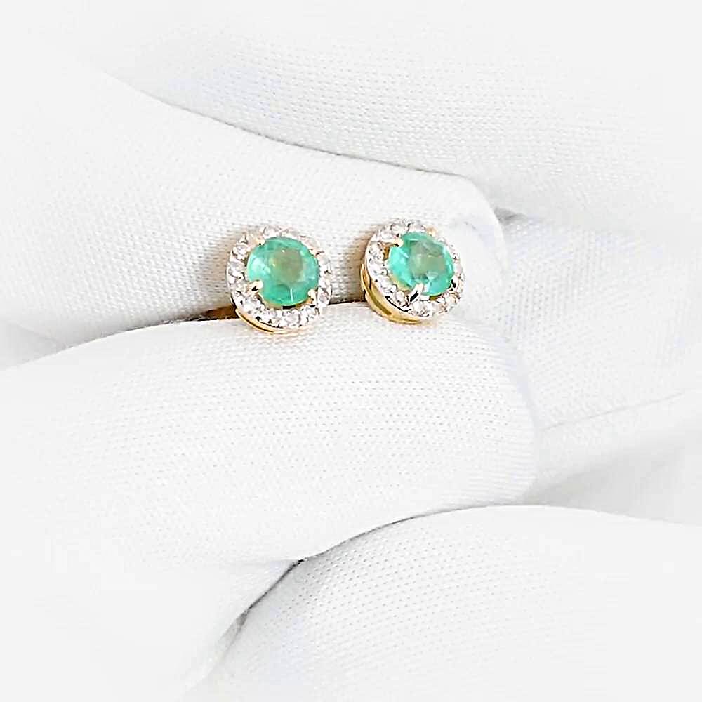 Серьги с изумрудами и бриллиантами из красного золота 585 пробы