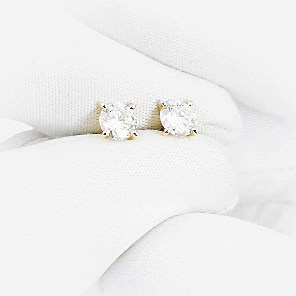 Серьги с муассанитами из желтого золота 585 пробы