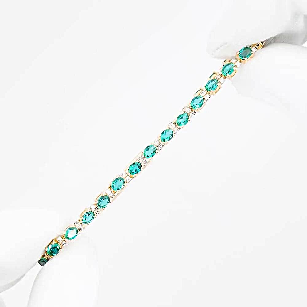 Браслет с гидротермальным изумрудом и бриллиантами из красного золота 585 пробы