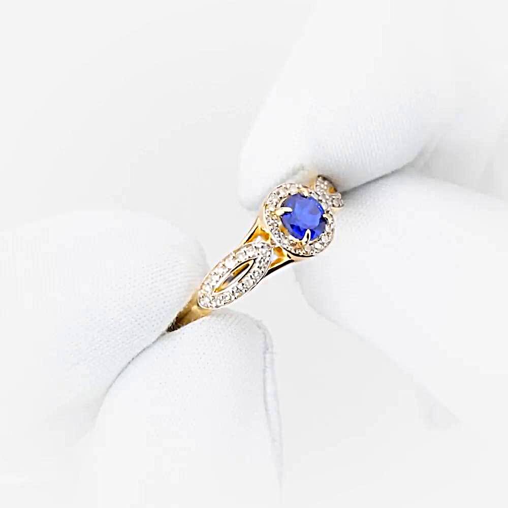 Кольцо с сапфиром синтетическим и бриллиантами из красного золота 585 пробы