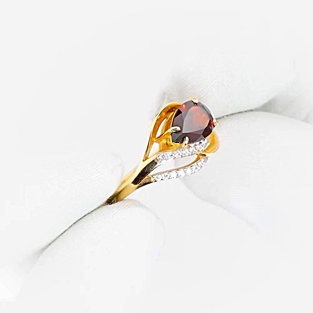 Кольцо с гранатами и фианитами из красного золота 585 пробы 1