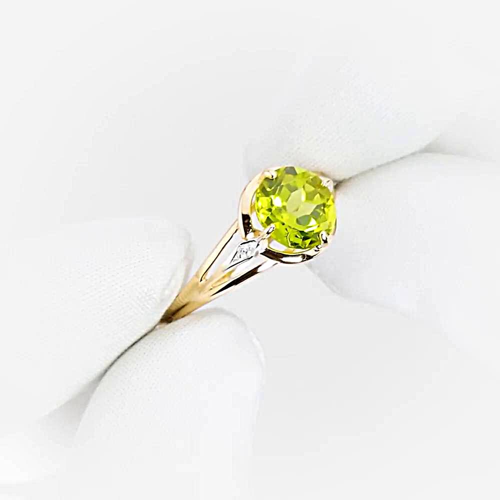 Кольцо с хризолитами и фианитами из красного золота 585 пробы 1