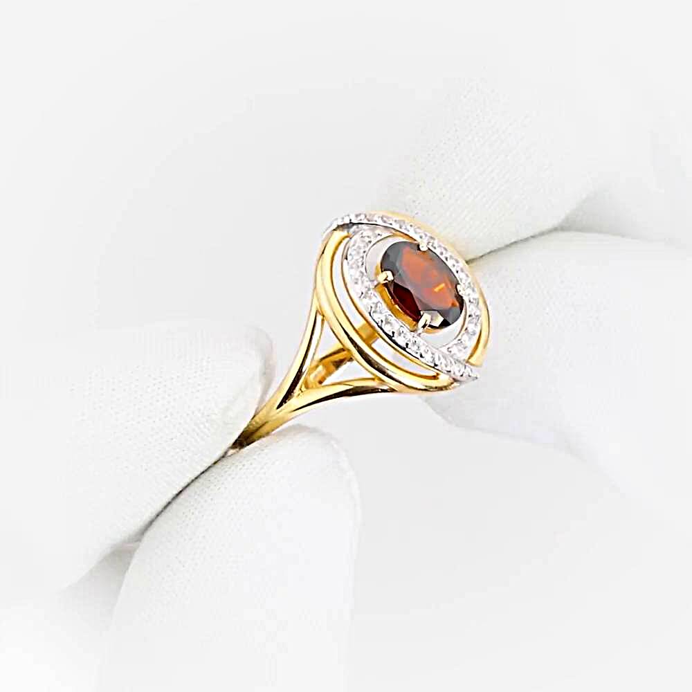 Кольцо с гранатами и фианитами из красного золота 585 пробы 1