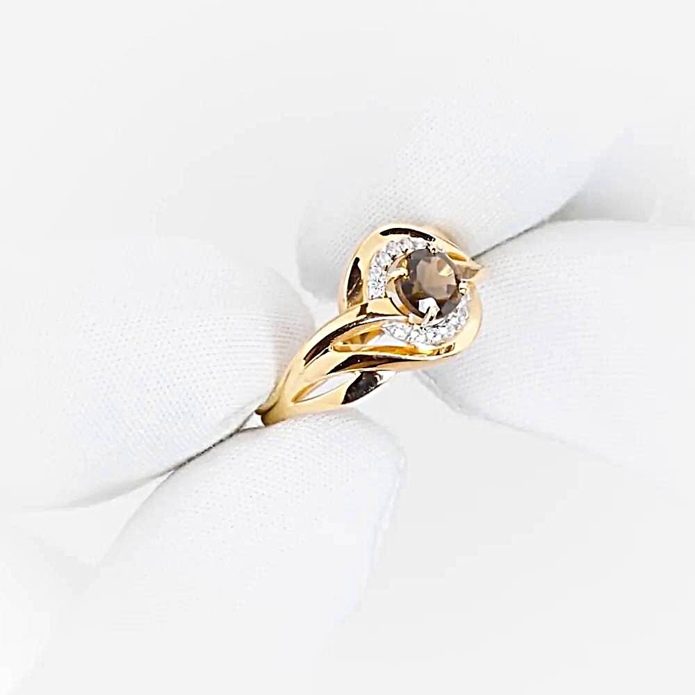 Кольцо с раух-топазами и фианитами из красного золота 585 пробы 1