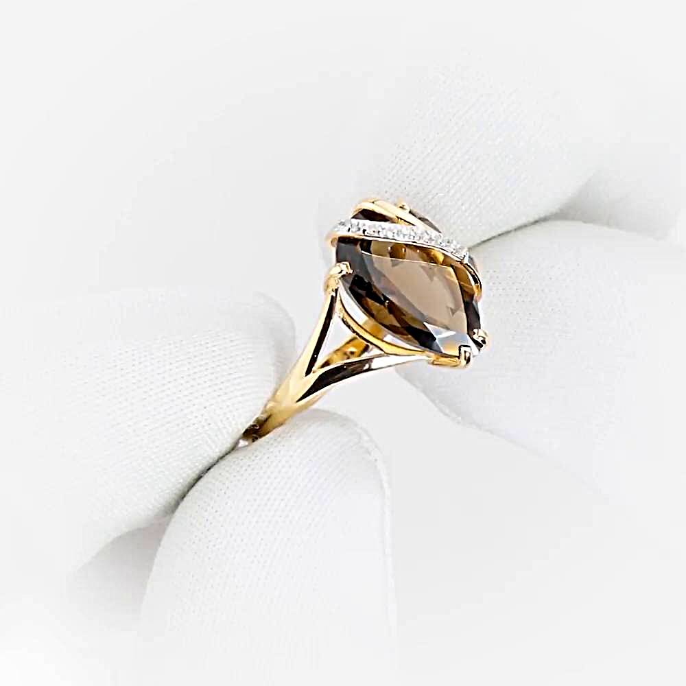 Кольцо с раух-топазами и фианитами из красного золота 585 пробы 1