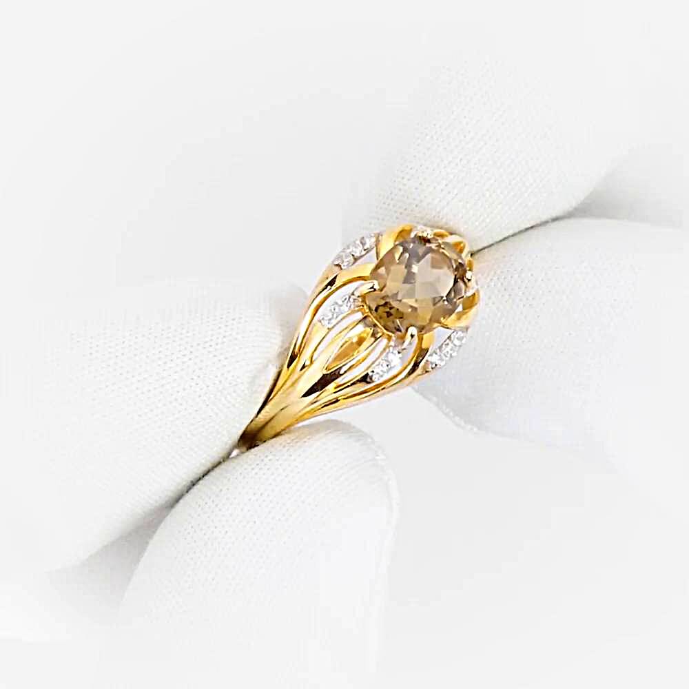 Кольцо с раух-топазами и фианитами из красного золота 585 пробы 1