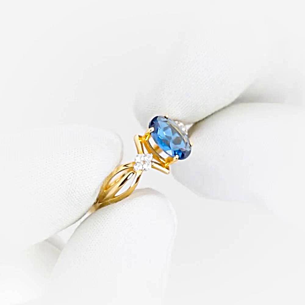 Кольцо с топазом лондон и фианитами из красного золота 585 пробы 1