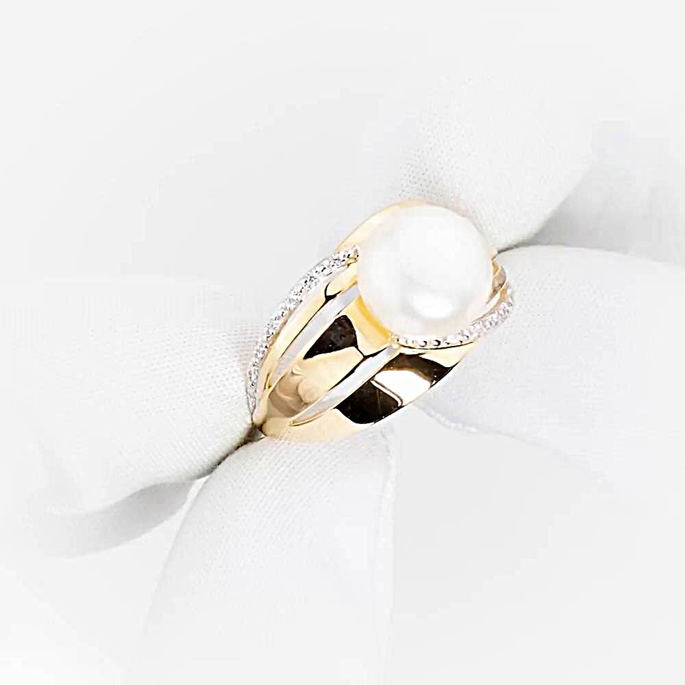 Кольцо с культивированным жемчугом и фианитами из красного золота 585 пробы 1