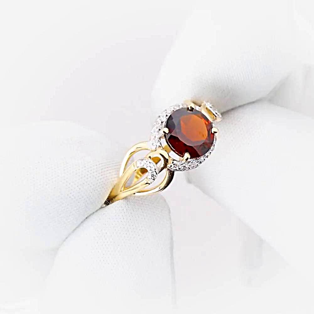 Кольцо с гранатами и фианитами из красного золота 585 пробы 1