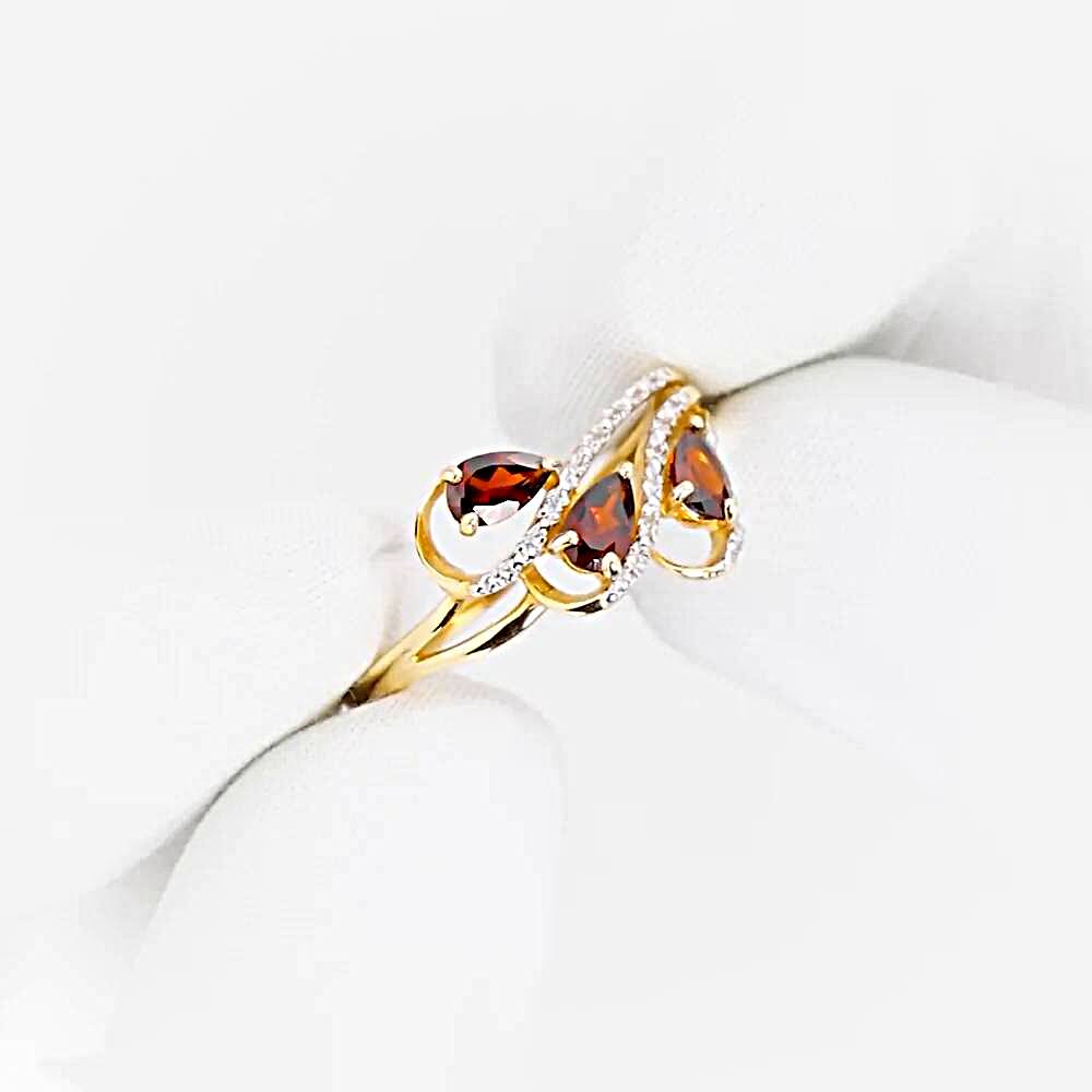 Кольцо с гранатами и фианитами из красного золота 585 пробы 1