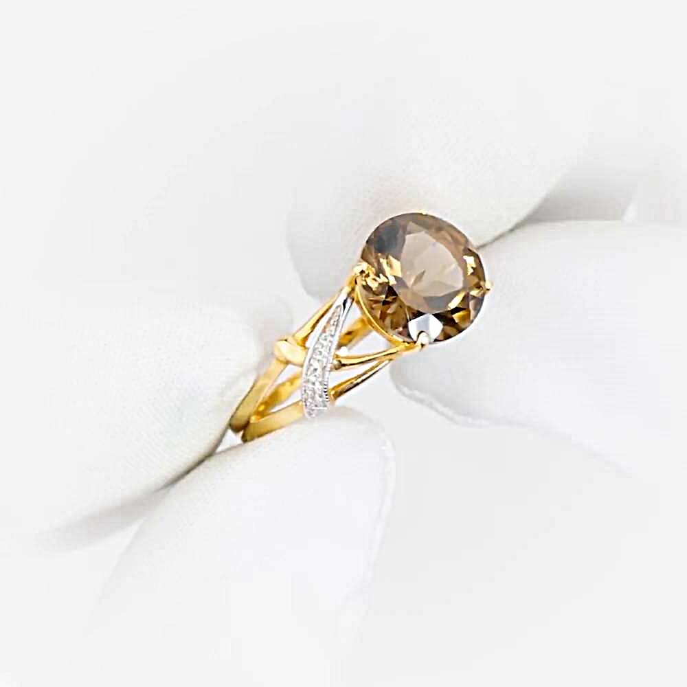 Кольцо с раух-топазами и фианитами из красного золота 585 пробы 1