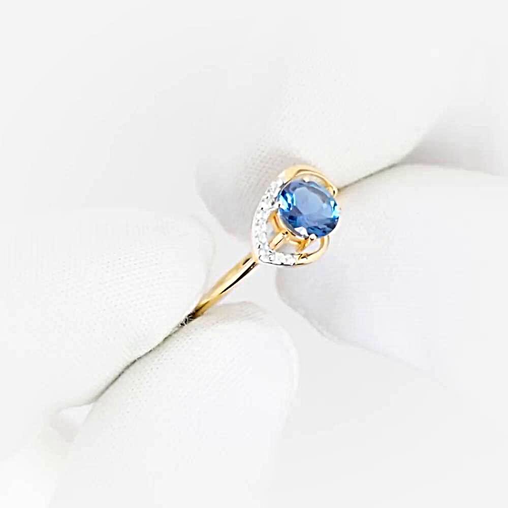 Кольцо с топазом лондон и фианитами из красного золота 585 пробы 1