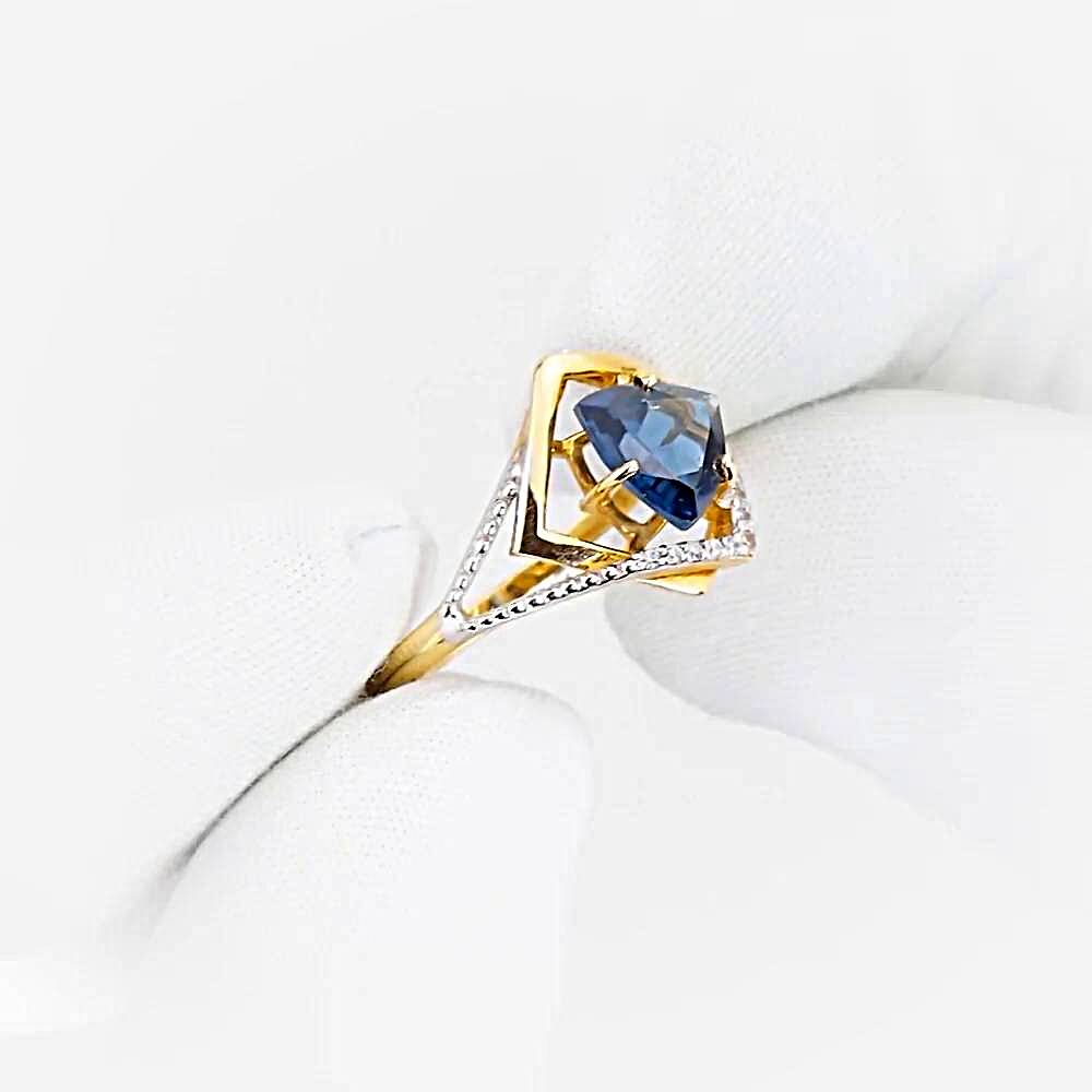 Кольцо с топазом лондон и фианитами из красного золота 585 пробы 1