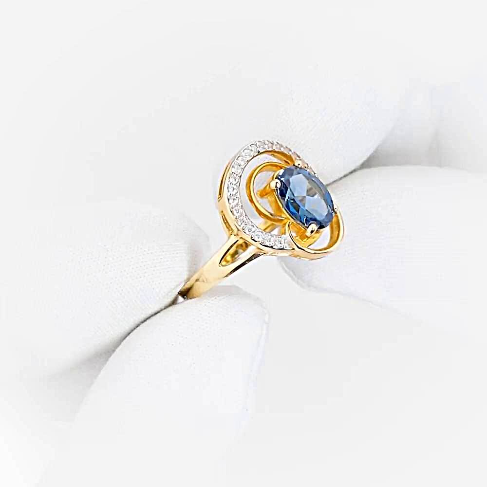 Кольцо с топазом лондон и фианитами из красного золота 585 пробы 1