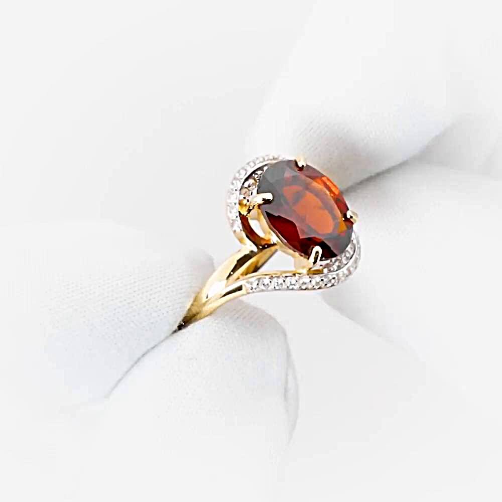 Кольцо с гранатами и фианитами из красного золота 585 пробы 1