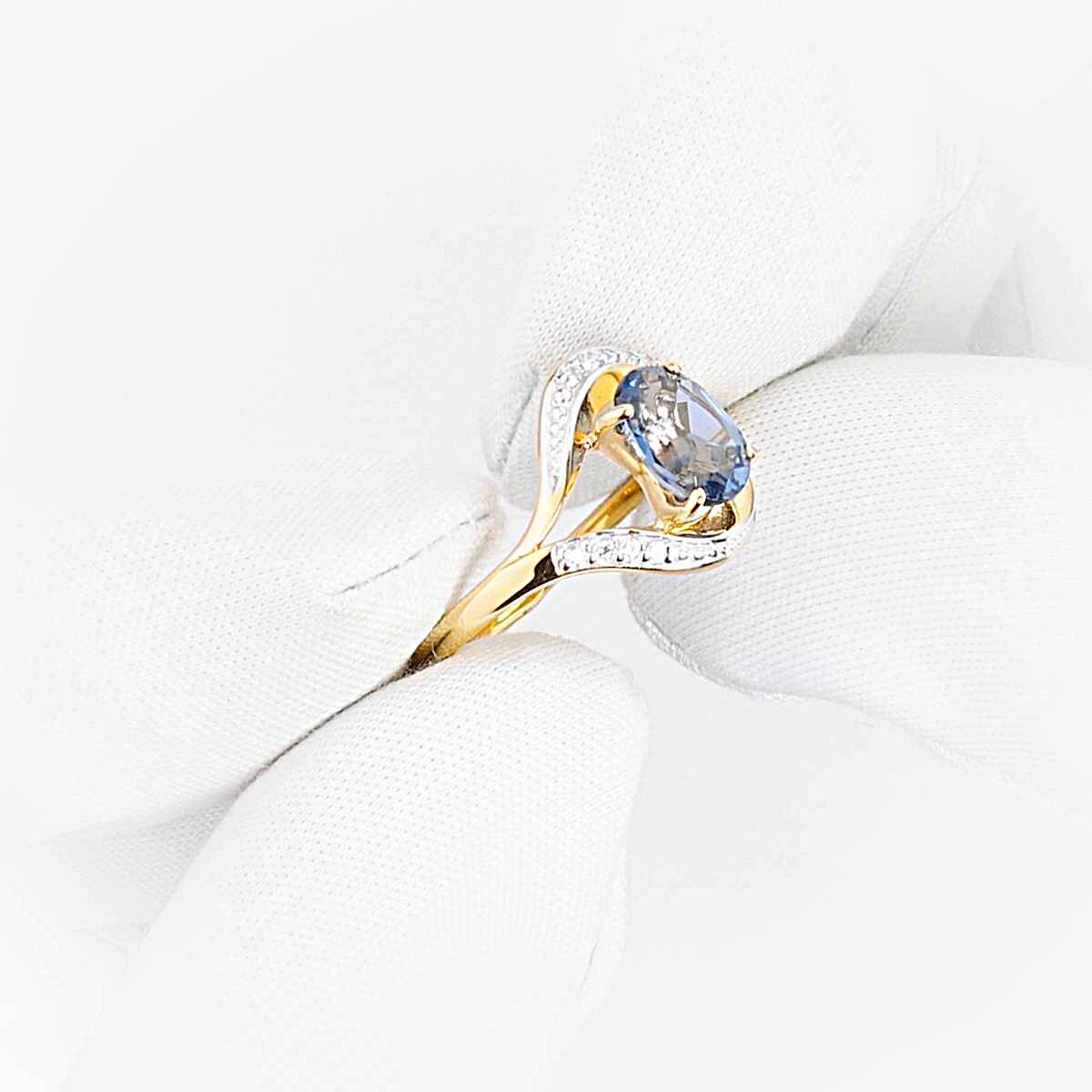 Кольцо с топазом лондон и фианитами из красного золота 585 пробы 1