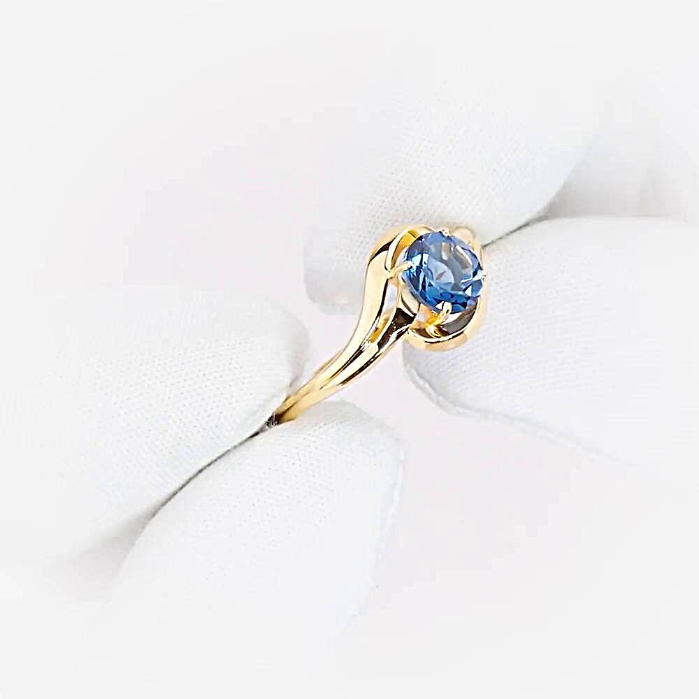 Кольцо с топазом лондон из красного золота 585 пробы 1