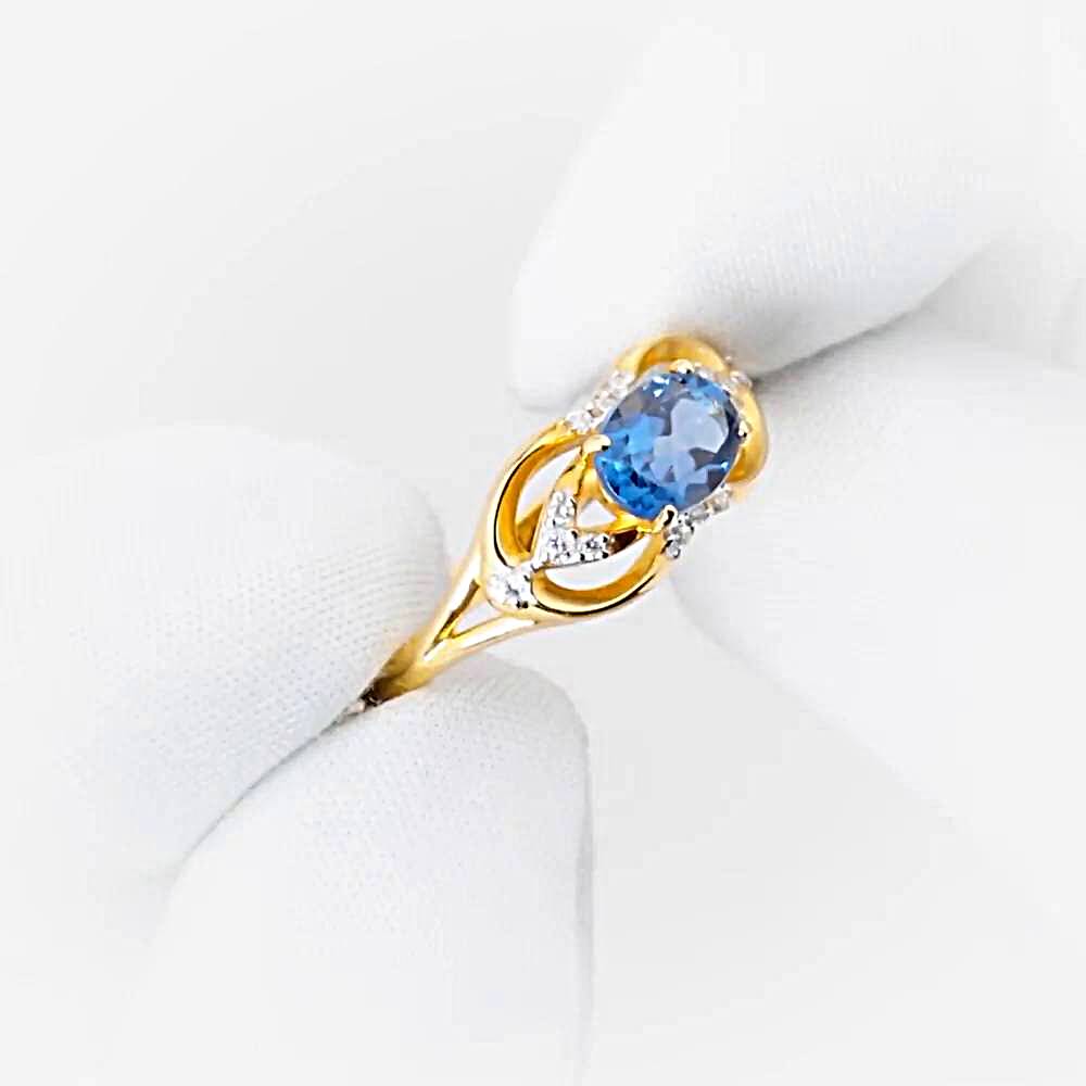 Кольцо с топазом лондон и фианитами из красного золота 585 пробы 1