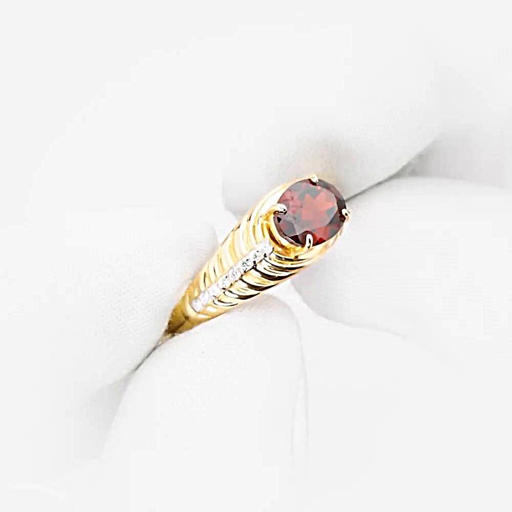 Кольцо с гранатами и фианитами из красного золота 585 пробы 1