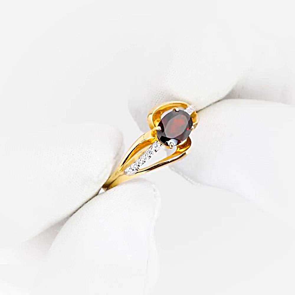 Кольцо с гранатами и фианитами из красного золота 585 пробы 1