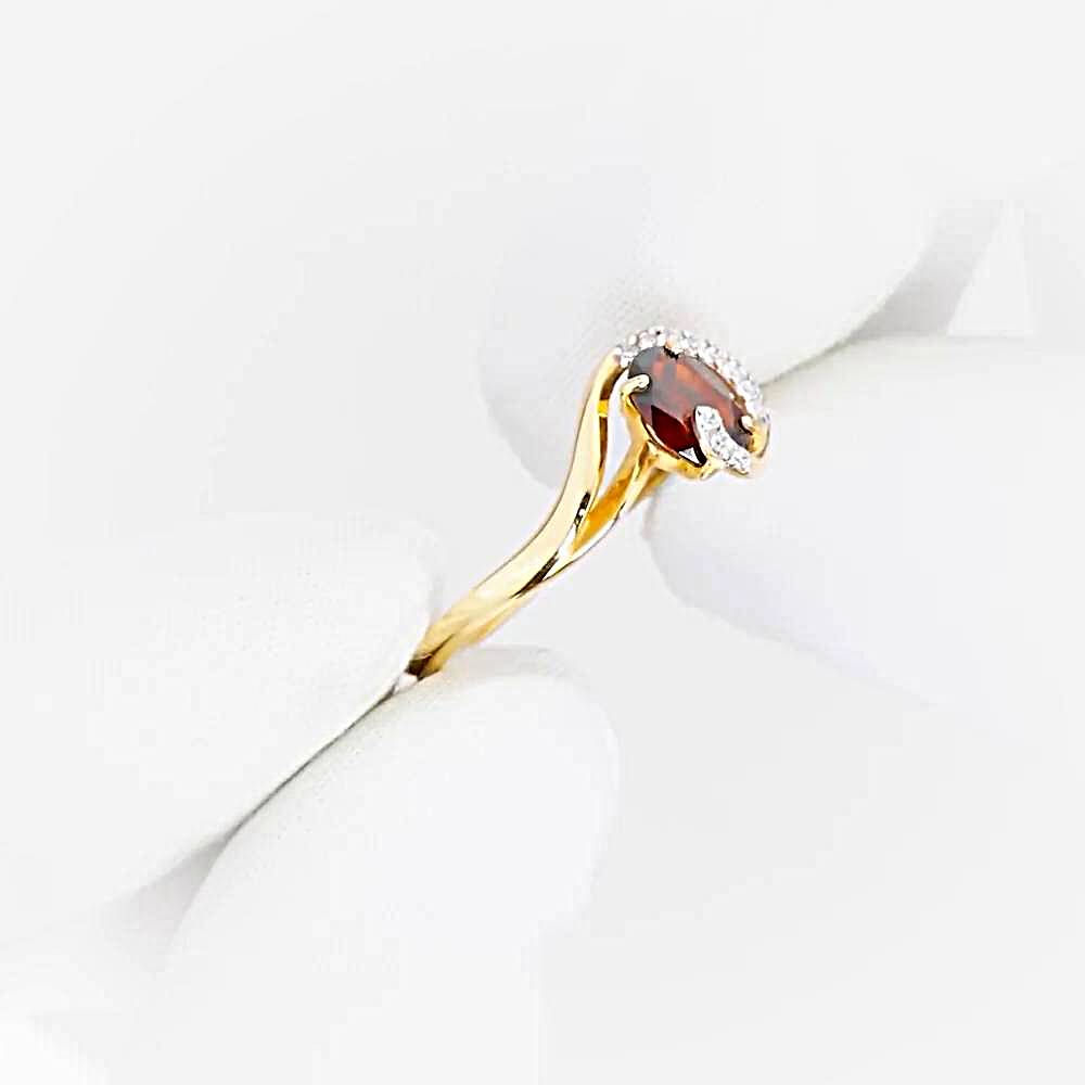 Кольцо с гранатами и фианитами из красного золота 585 пробы 1