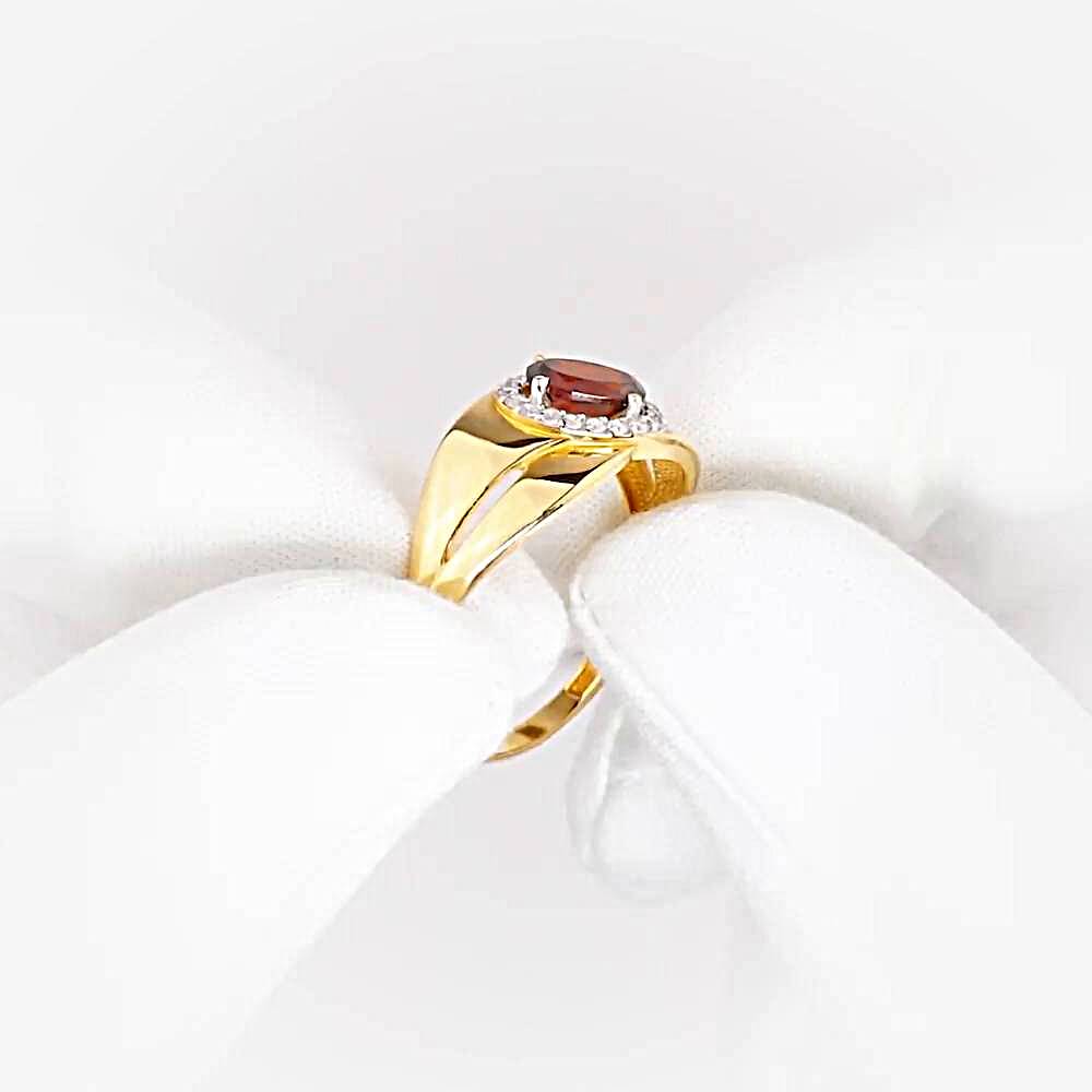 Кольцо с гранатами и фианитами из красного золота 585 пробы 1