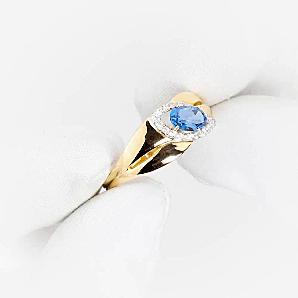 Кольцо с топазом лондон и фианитами из красного золота 585 пробы 1