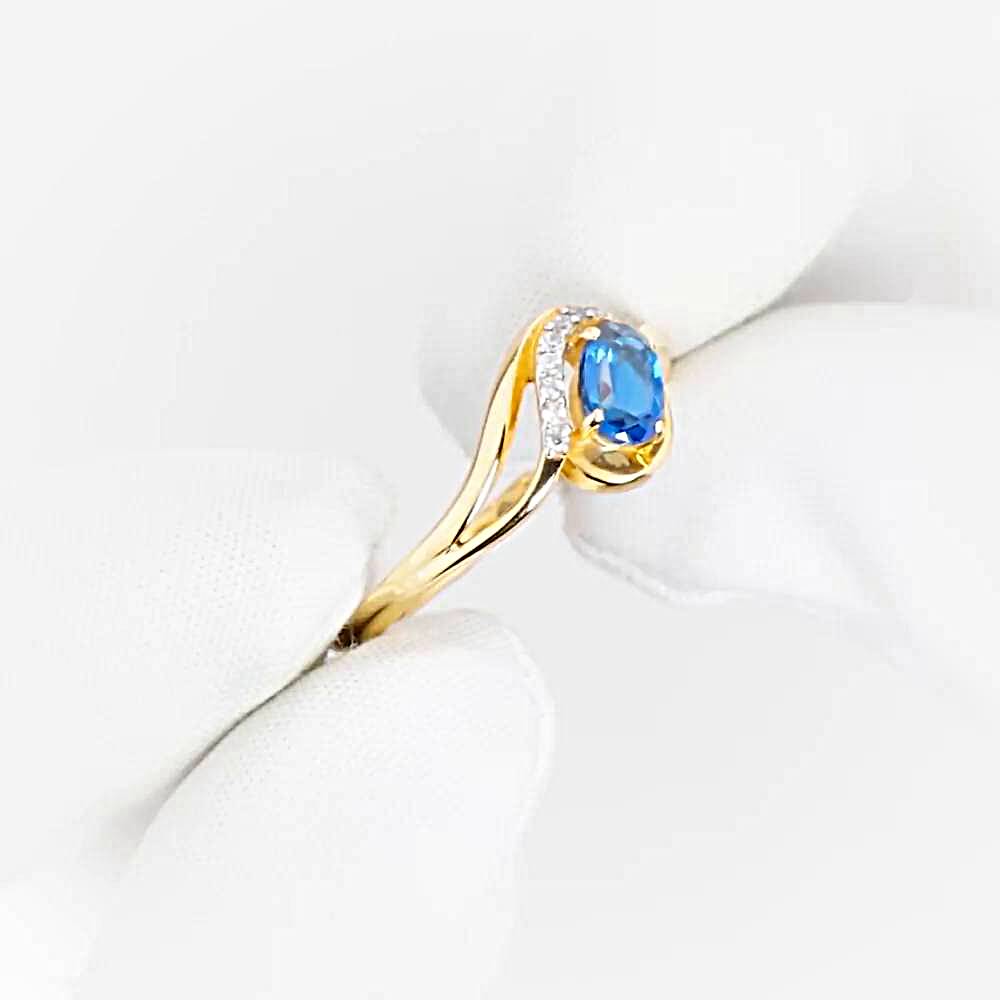 Кольцо с топазом лондон и фианитами из красного золота 585 пробы 1