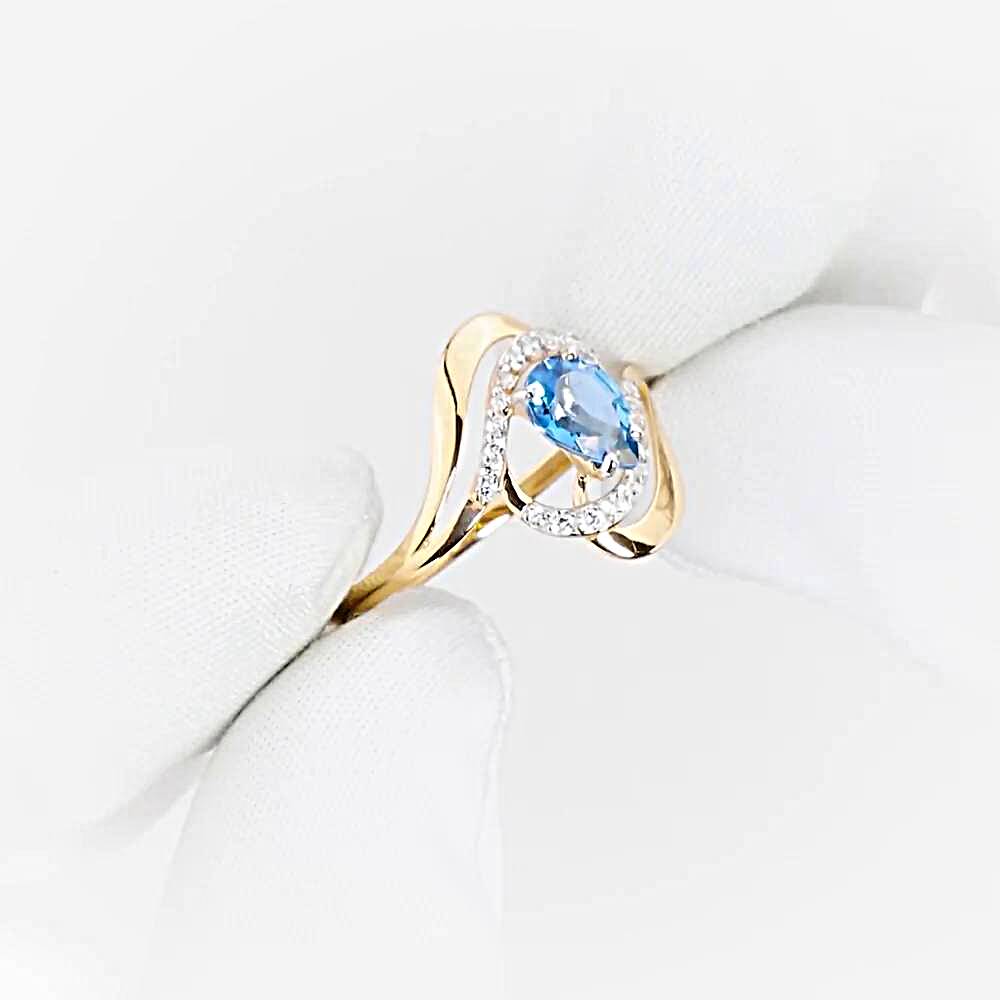 Кольцо с топазом лондон и фианитами из красного золота 585 пробы 1