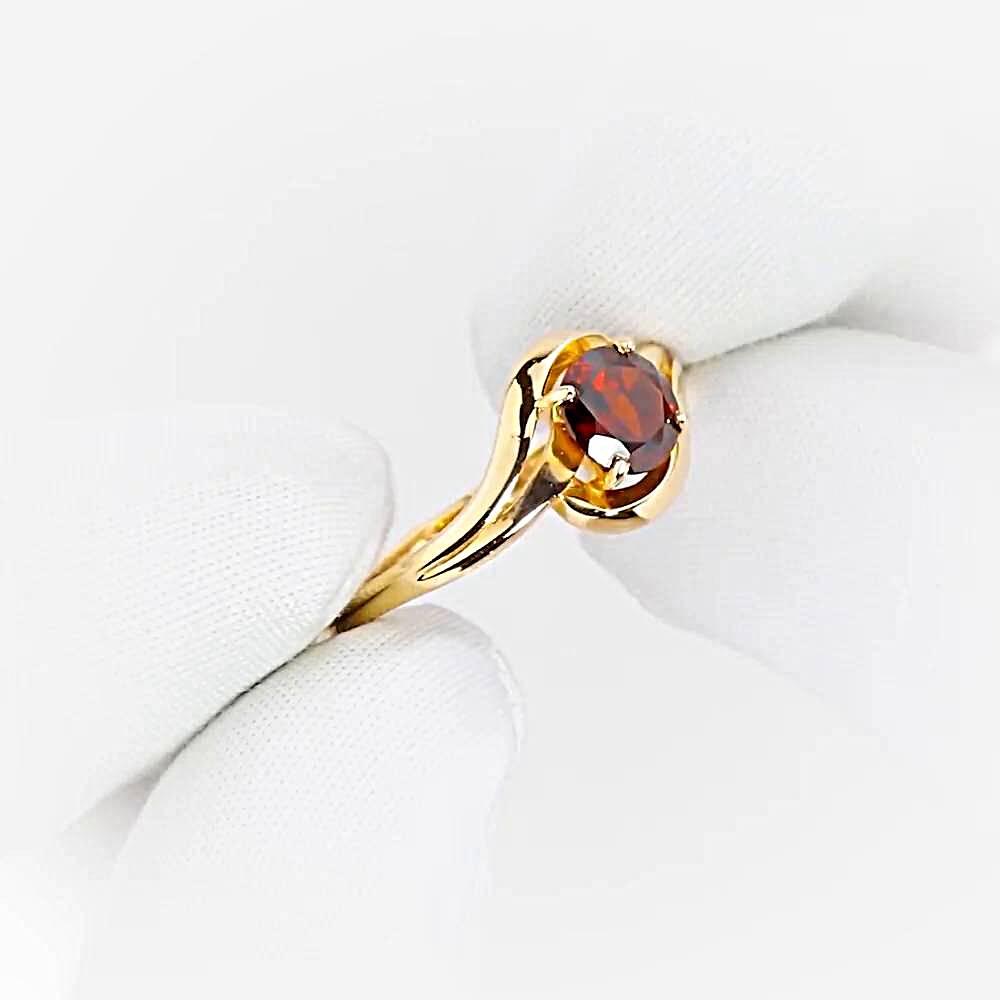 Кольцо с гранатом из красного золота 585 пробы 1